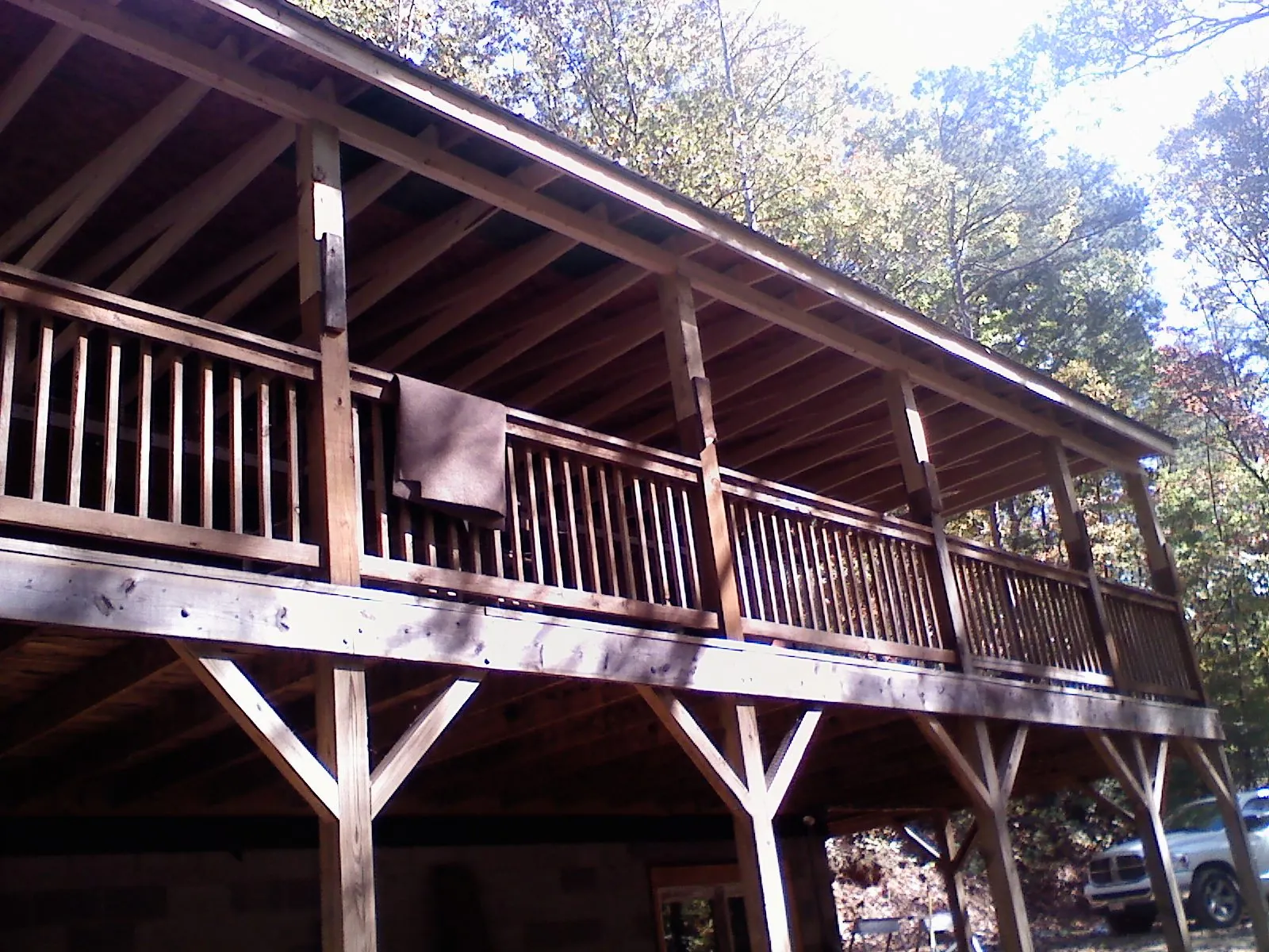 Timber framing under a new elevated porch and deck — Roof Leak Repair in New Lebanon by Roofing Brothers